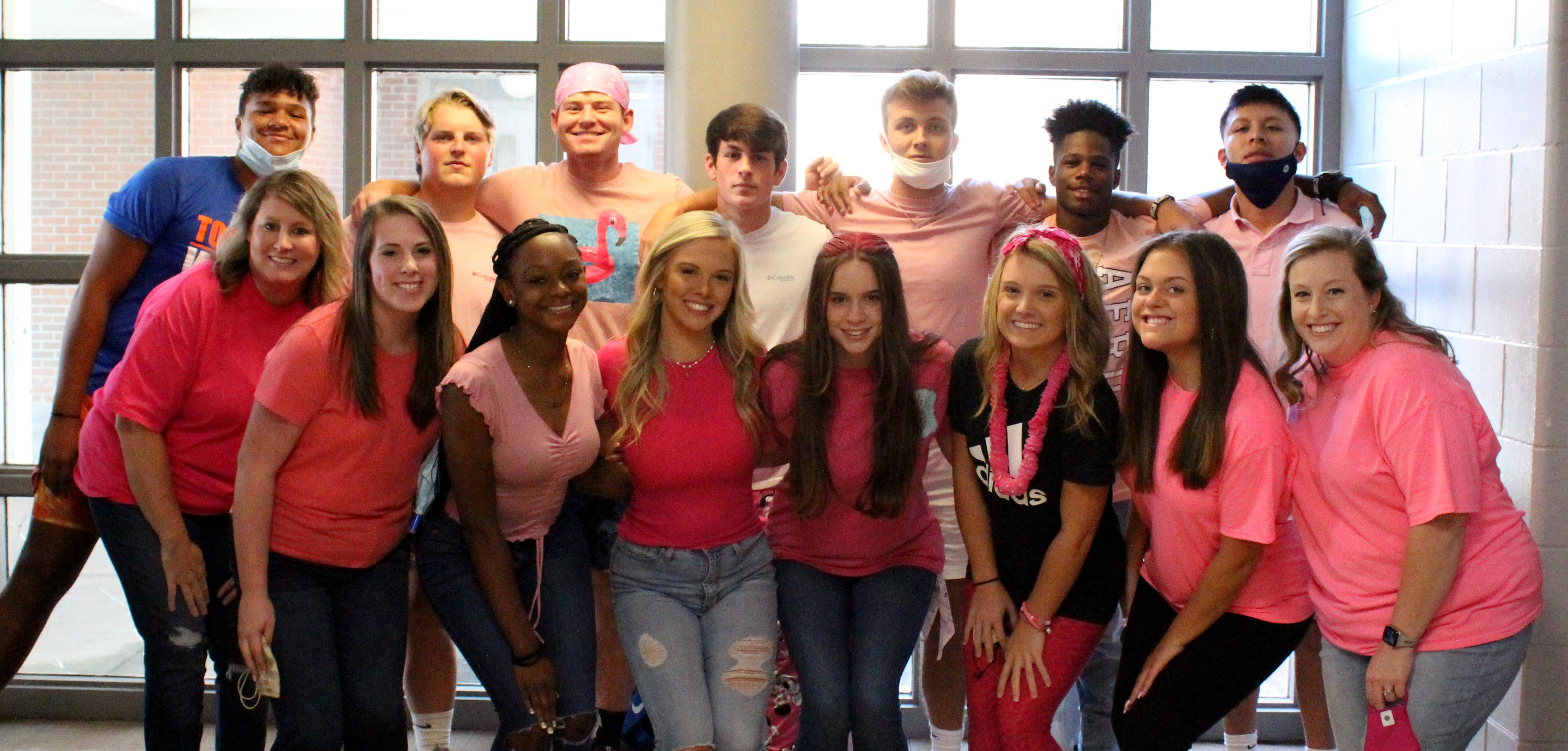 Students and staff wear pink to support the Tigers against Jemison