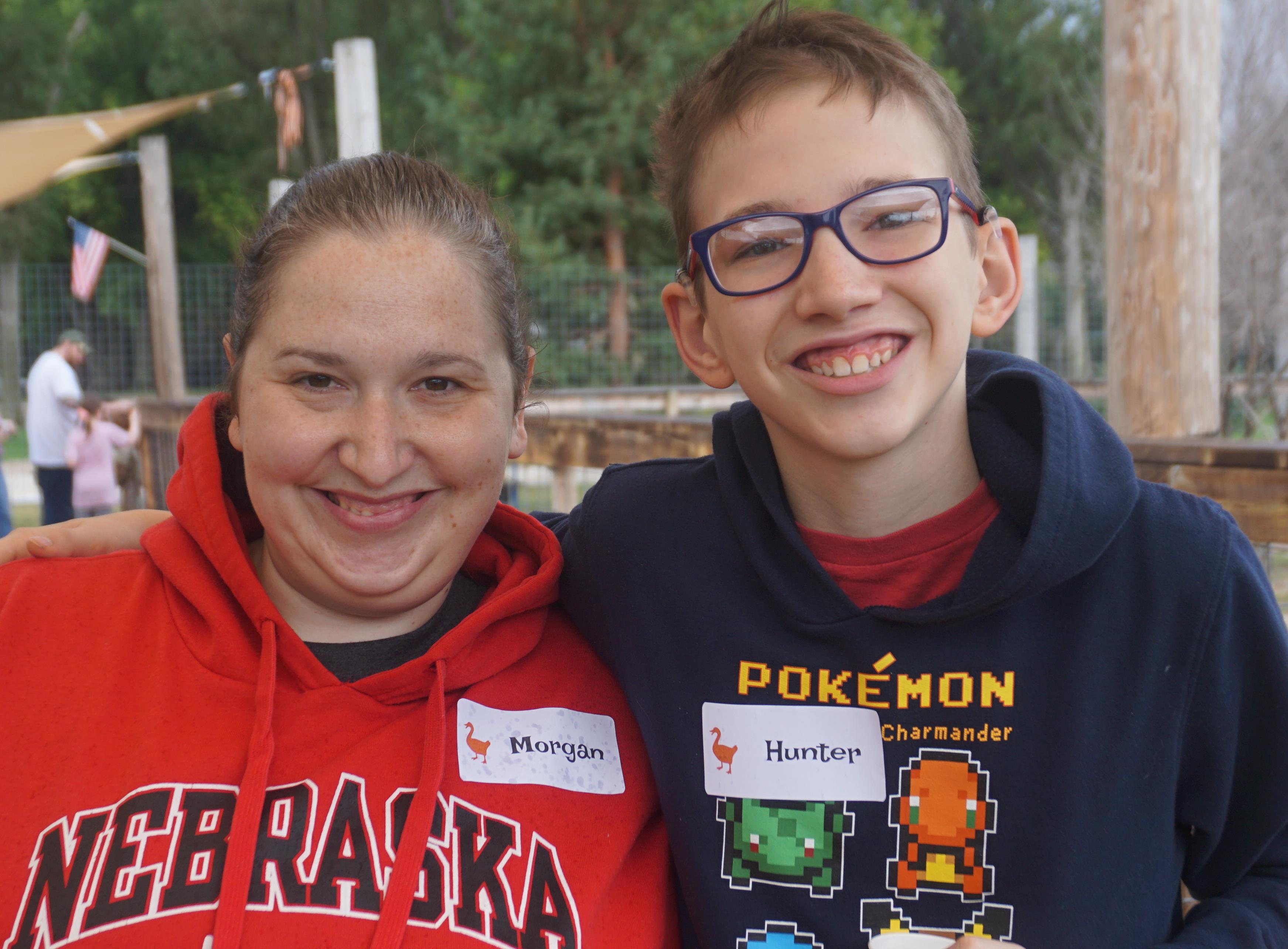 mom and son smiling for a photo