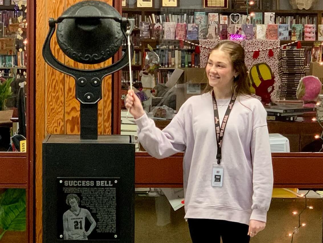 Lauryn Watkins rings the success bell at Ada High School.