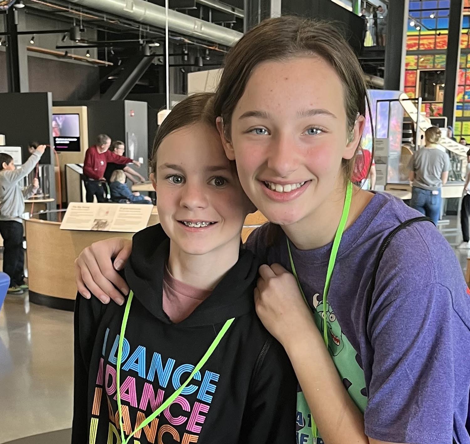 two girls posing for a photo