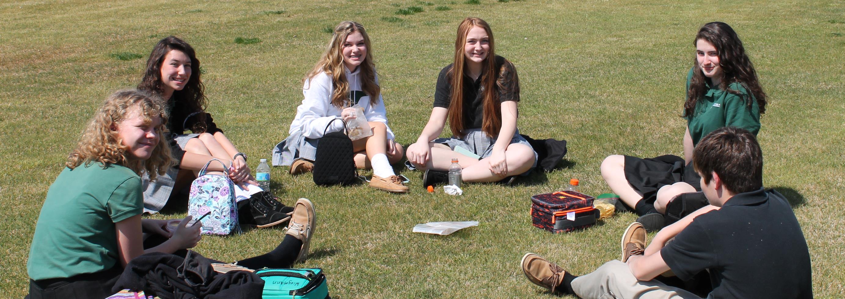 Students eating lunch outside