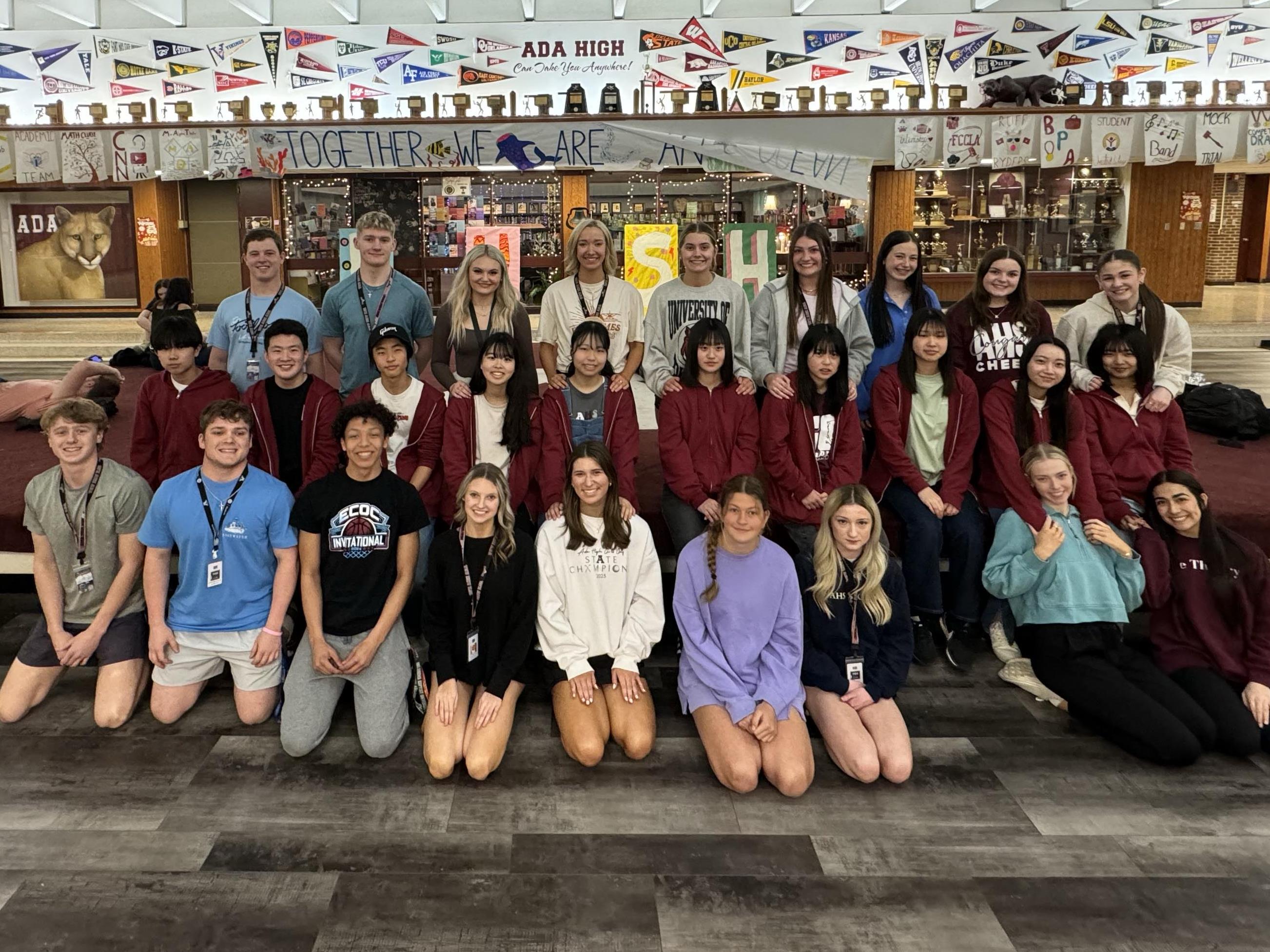 Ada High School students and exchange students from the Ibaraki Christian High School in Japan pose for a group picture.