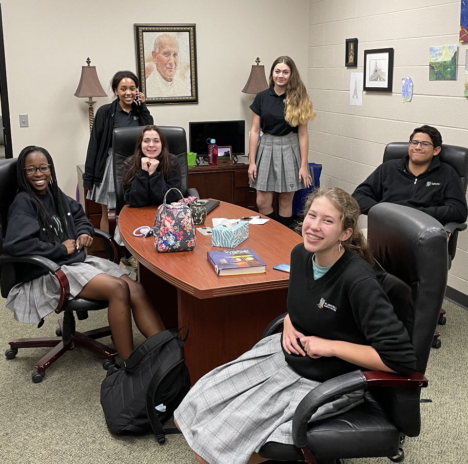 Students sitting around a table