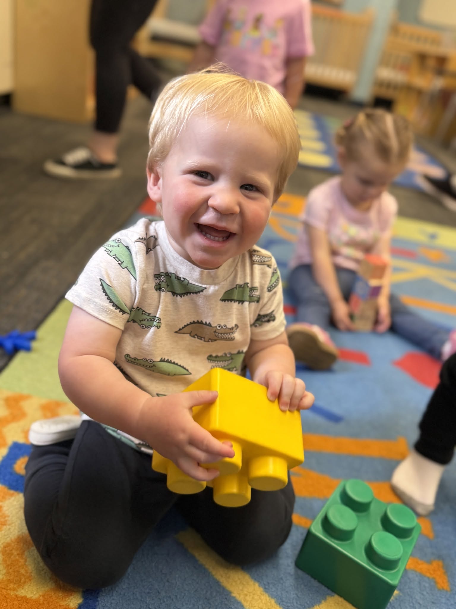 Student playing with blocks