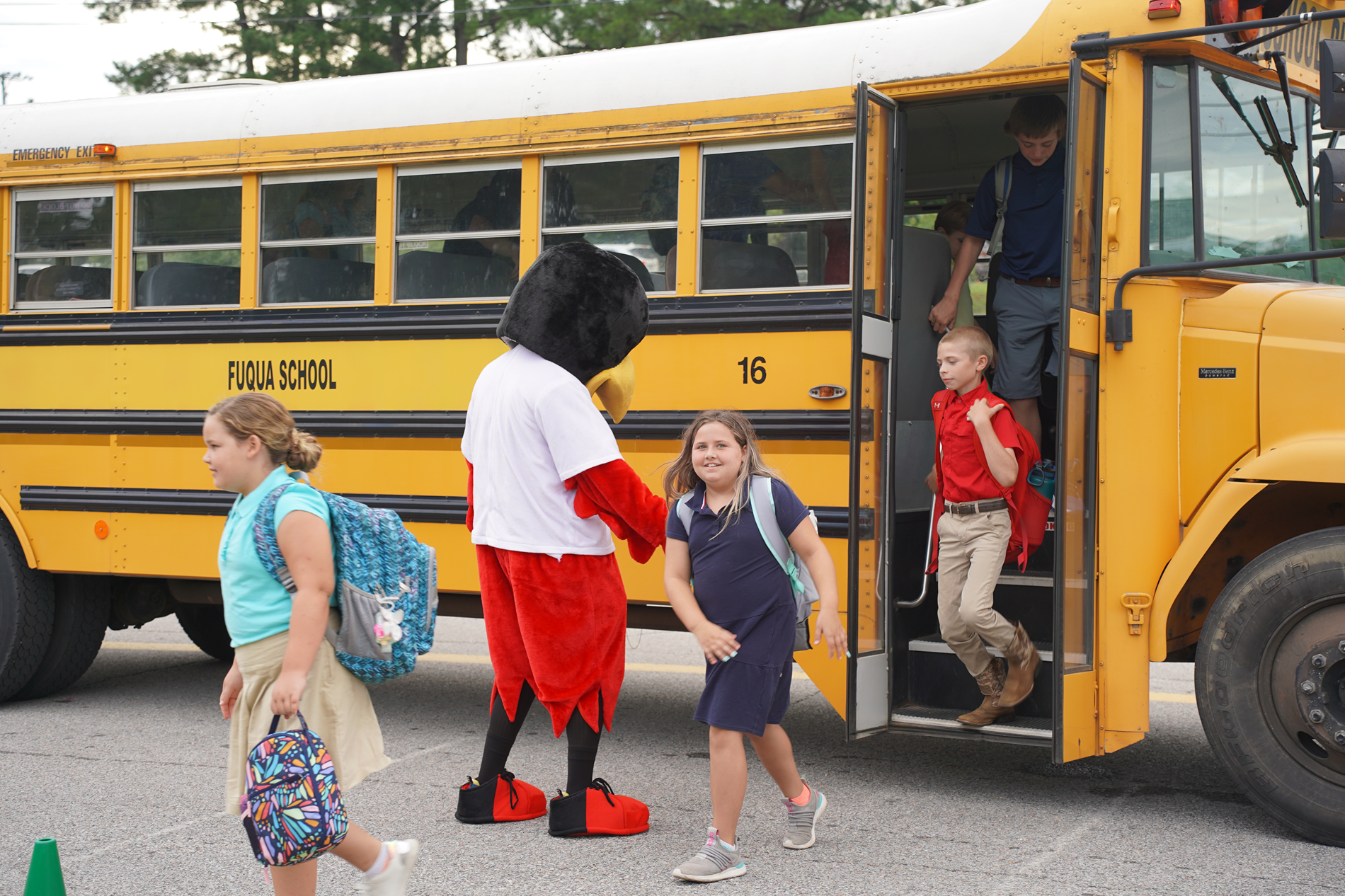 Students riding a school bus