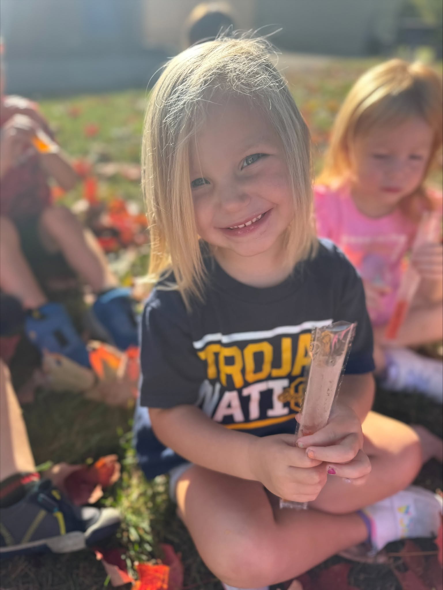 Student eating a popsicle